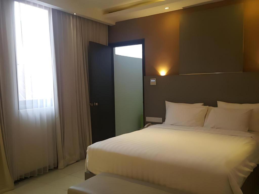 Kharisma Hotel 茉莉芬 外观 照片